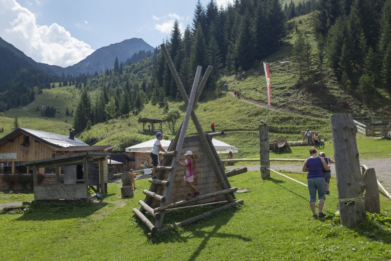 Little ones can romp about the spacious playground; big ones can explore the surrounding peaks and mountains.