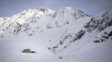 A home in the snow: the Amberger H&uuml;tte in the Stubai Alps.
