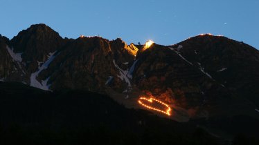 Summer solstice fires on the Nordkette mountains above Innsbruck, © Tirol Werbung/Christian Wührer