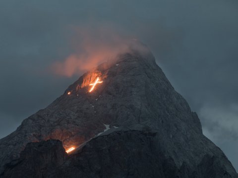 Summer solstice fire in the Tiroler Zugspitz Arena, 23.06.2018. Looking towards the Erwalder Sonnenspitze mountain
