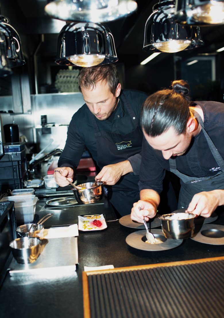 Risotto is normally made with rice, but Gunther D&ouml;berl (left) and his team opted for Tirolean barley at their Stiar restaurant in Ischgl.