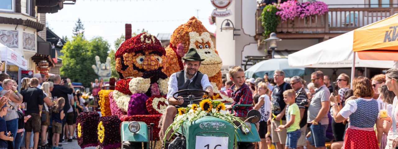 Super Mario at the Kirchberg Flower Parade Festival, © TVB Kitzbüheler Alpen - Brixental