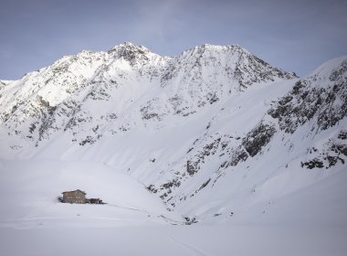 A home in the snow: the Amberger H&uuml;tte in the Stubai Alps.
