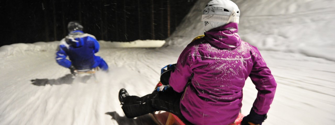 Tobogganing at night, © SkiWelt Wilder Kaiser - Brixental Christian Kapfinger