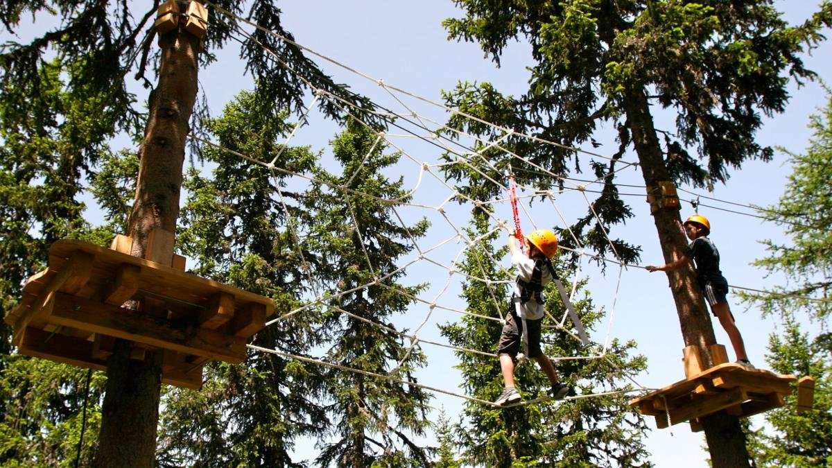 The Achensee Adventure Park offers plenty of fun for all the family. The main highlight is the rope obstacle course featuring high-speed zipwires and more than 40 treetop platforms. Visitors with a strong stomach can test their nerves with a jump into the giant airbag at the thrilling Bag Jump., © Abenteuerpark Achensee