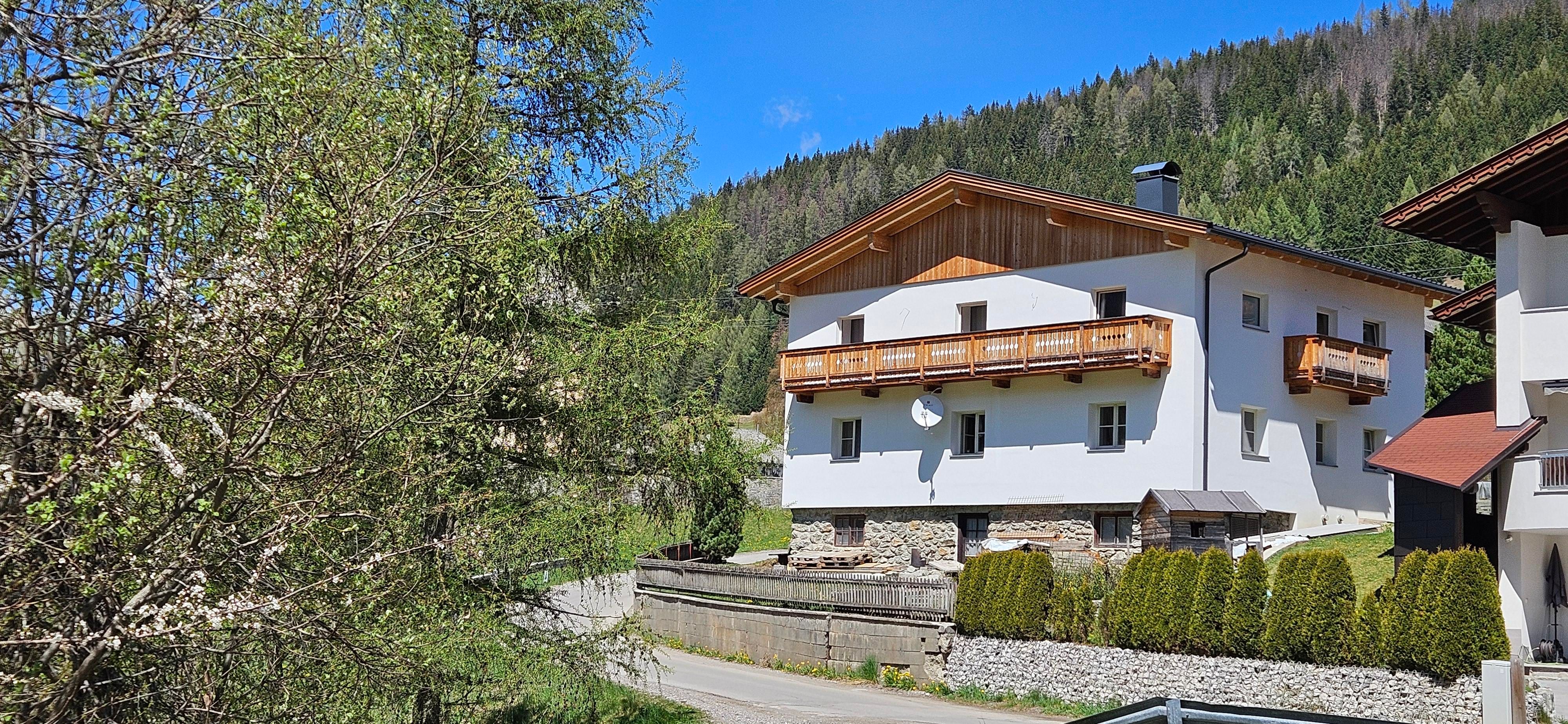 A charming house in a picturesque setting.
