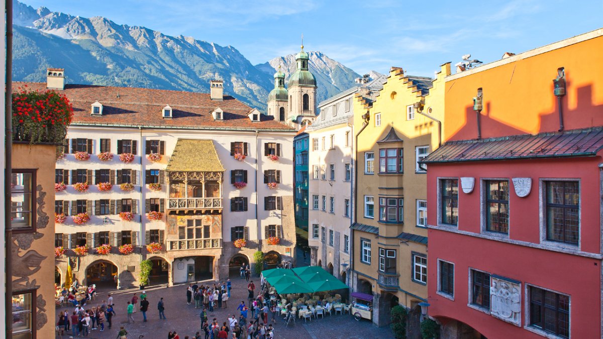 Innsbruck is known as the capital of the Alps, a buzzing city surrounded by 2,000 metre peaks playing host to an endless array of outdoor activities, from climbing to watersports. The historic old town is as beautiful as its mountainous backdrop, with the famous Golden Roof just the start of its cultural offerings., © Innsbruck Tourismus