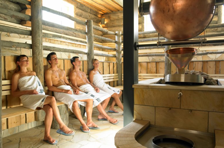 The double-level loft sauna in the Aqua Dome has a clever automated machine to pour water onto the hot stones and fan the hot air across the sauna., © Aqua Dome