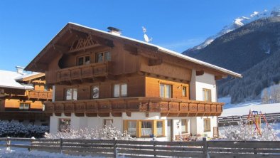 Winterfoto Haus Alpenmelodie