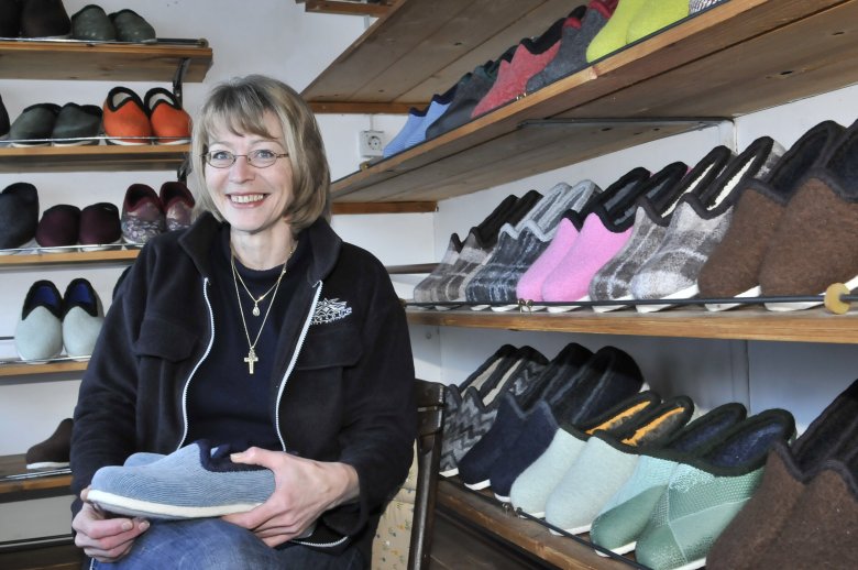 Frau Naschberger from Reith im Alpbachtal with a pair of her homemade &quot;Doggln&quot; slippers.