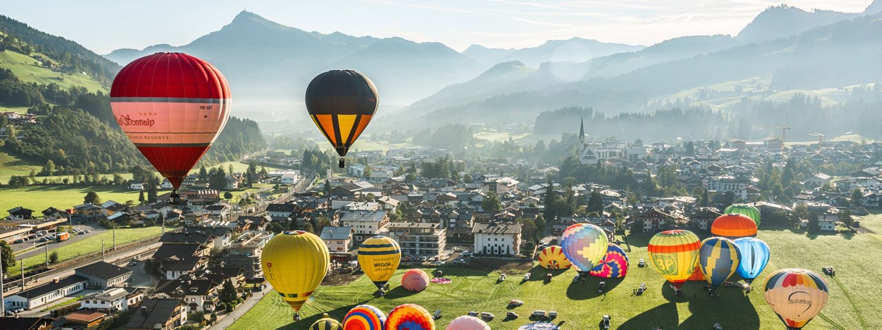 A kaleidoscope of colours takes over the sky at the International Libro Ballooning Cup in Kirchberg, © Kurt Tropper