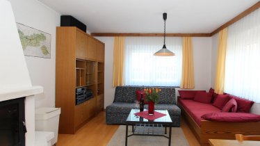 Wohnzimmer mit Einzelbett