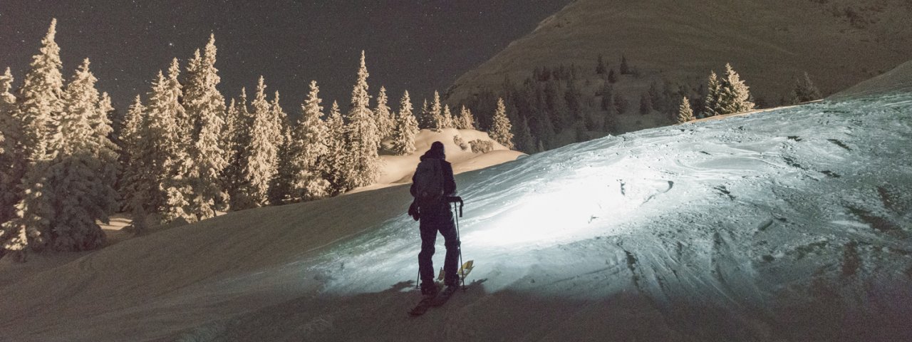 Night ski touring on pistes