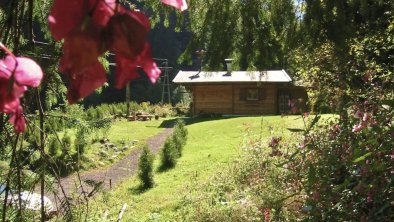 Hütte Waldzeit und Garten im Sommer