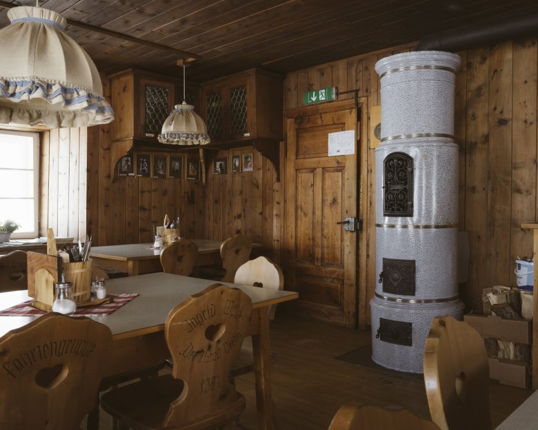 The hut&#39;s cosy dining room is a great place to relax.