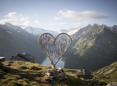 Olperer Hut in Zillertal Valley offers incredible views of mountain peaks and a glinting lake
