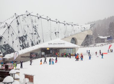 The snow-covered Galzigbahn cable car.